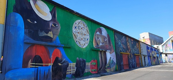 CIRcularReal Estate thematic photo featuring an industrial building with a colorful graffiti on it