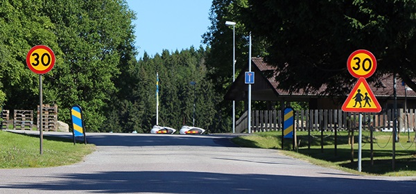 Traffic safety thematic photo featuring speed calming measures in a residential area.